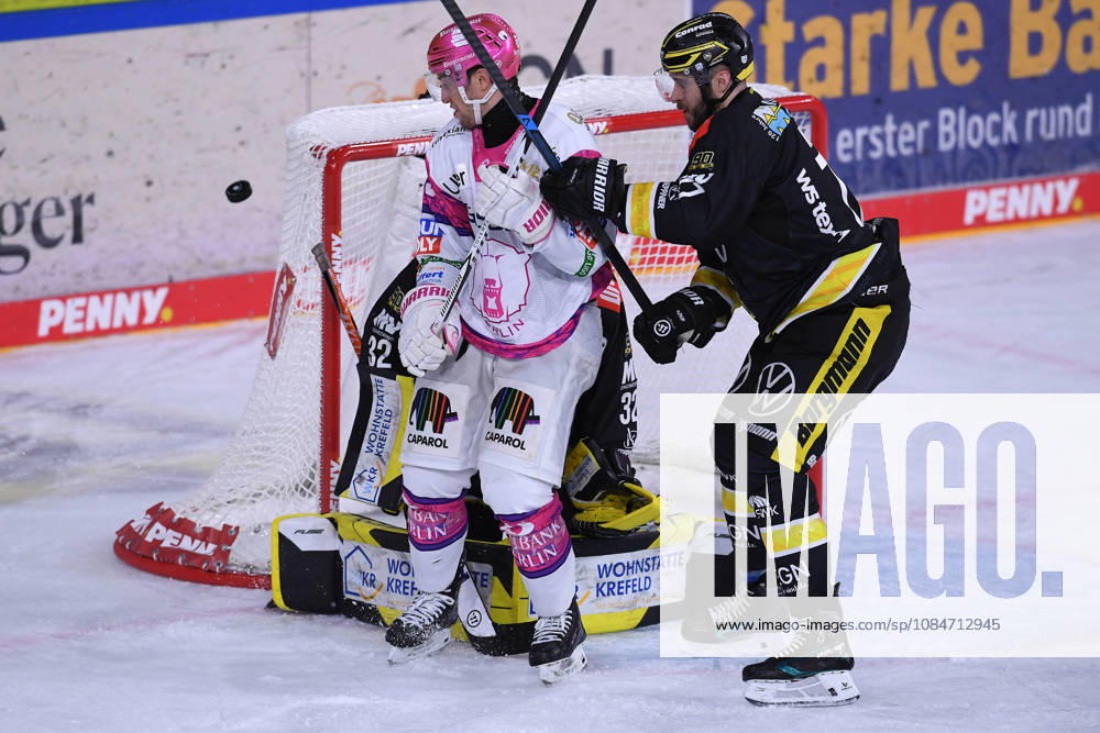 Ice Hockey: Penny DEL, Matchday 10—Krefeld Pinguine vs. Eisbären Berlin on October 18, 2026, at the Yayla Arena in Krefeld; Frederik Tiffels (Berlin), on the left, Mick Köhler (Krefeld); on the right, In accordance with the regulations of the DEL (German Ice Hockey League), the publication and reuse of the images in electronic media and on devices of any kind during the game is not permitted. xRx
