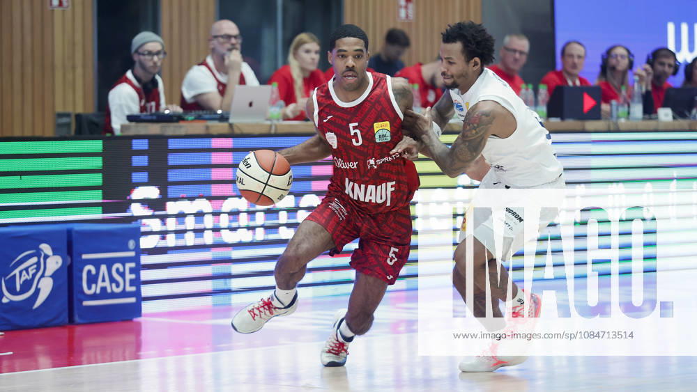 Pictured from left: Kenny Dye of Wuerzburg Baskets, No. 5, with the ball against DeLonnie Hunt of Syntainics MBC, No. 3 (18 10 2026), Fitness First Würzburg Baskets vs. SYNTAINICS MBC, Netto BBL Cup, Round of 16, Germany, 97072, tectake Arena Würzburg,