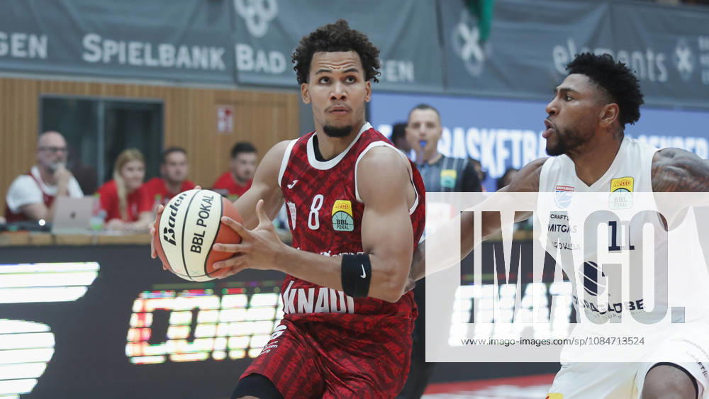 Pictured from left: Brandon Tischler of Würzburg Baskets, No. 8, with the ball against Anthony Gaines of Syntainics MBC, No. 11, 18, 10, 2026, Fitness First Würzburg Baskets vs. SYNTAINICS MBC, Netto BBL Cup, Round of 16, Germany, 97072, tectake Arena Würzburg,