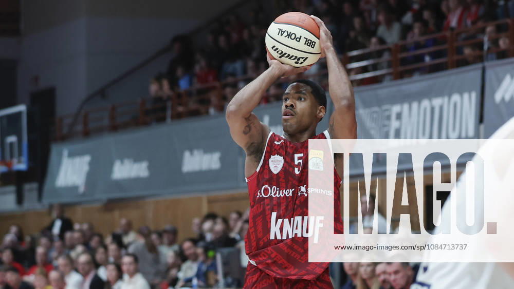 Pictured: Kenny Dye of the Würzburg Baskets, No. 5, making a three-pointer on October 18, 2026, Fitness First Würzburg Baskets vs. SYNTAINICS MBC, Netto BBL Cup, Round of 16, Germany, 97072, tectake Arena Würzburg,
