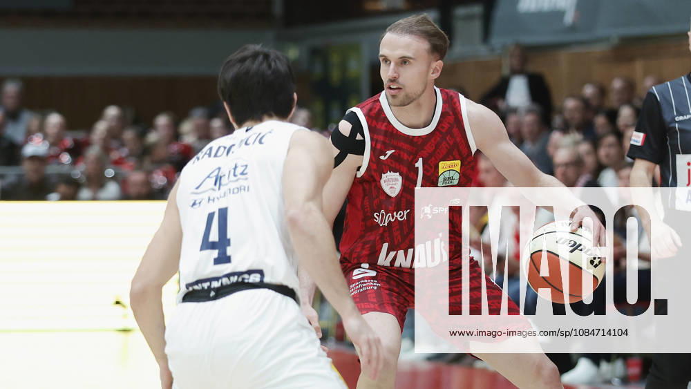 Pictured from left: Vuk Radojicic (SYNTAINICS MBC), No. 4, against Lukas Herzog (Würzburg Baskets), No. 1, with the ball, October 18, 2026, Fitness First Würzburg Baskets vs. SYNTAINICS MBC, Netto BBL Cup, Round of 16, Germany, 97072, tectake Arena Würzburg,