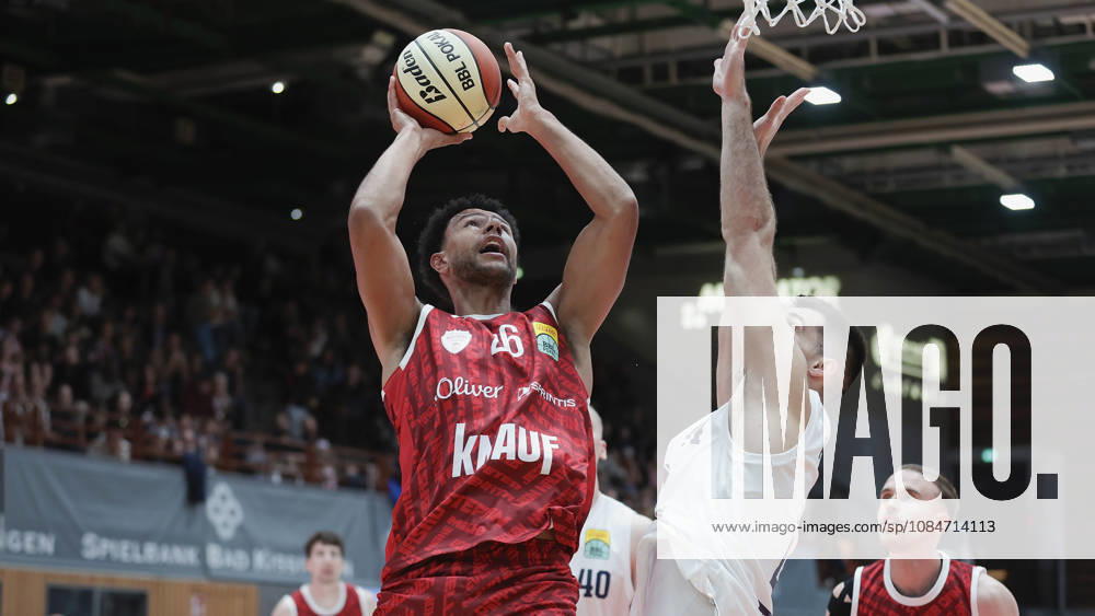 Pictured from left: Marvin Ogunsipe of Würzburg Baskets, No. 26, making a layup against Jure Planinic of Syntainics MBC, No. 44 (18 10 2026), Fitness First Würzburg Baskets vs. SYNTAINICS MBC, Netto BBL Cup, Round of 16, Germany, 97072, tectake Arena Würzburg,