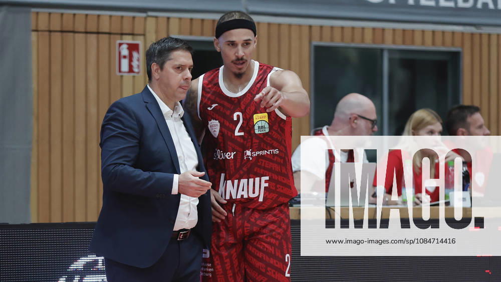 Pictured from left: Head Coach Sasa Filipovski of the Würzburg Baskets and Max Jones of the Würzburg Baskets, 2, in discussion on October 18, 2026, Fitness First Würzburg Baskets vs. SYNTAINICS MBC, Netto BBL Cup, Round of 16, Germany, 97072, tectake Arena Würzburg,