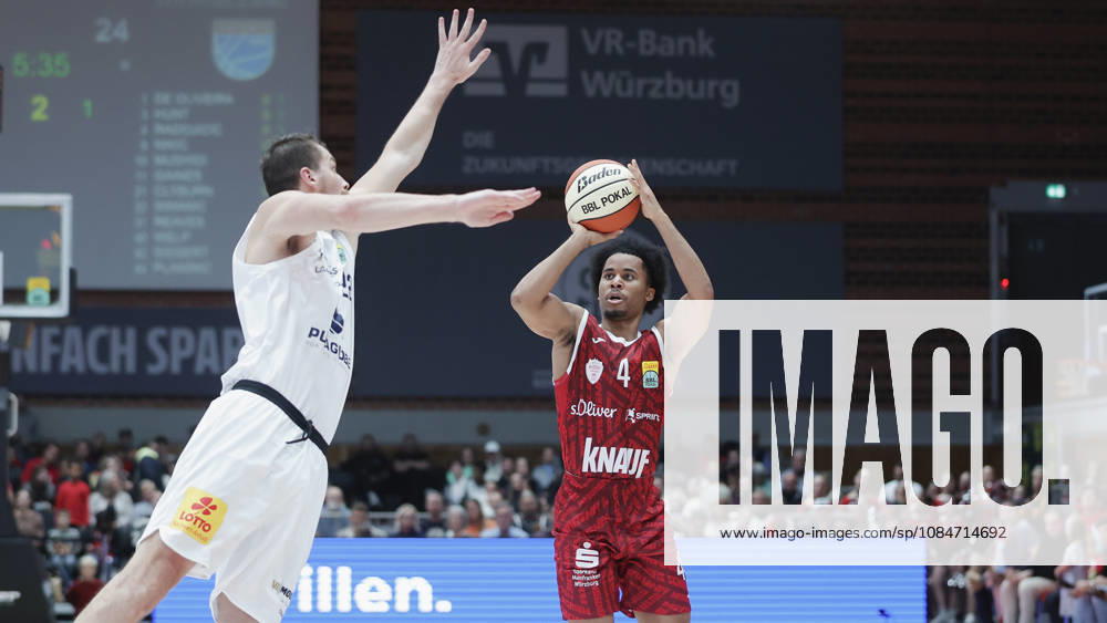 Pictured from left: Borisa Simanic of Syntainics MBC, 22, against Sam Griffin of Wuerzburg Baskets, 4, with a three-point shot, 18 10 2026, Fitness First Würzburg Baskets vs. SYNTAINICS MBC, Netto BBL Cup, Round of 16, Germany, 97072, tectake Arena Würzburg,