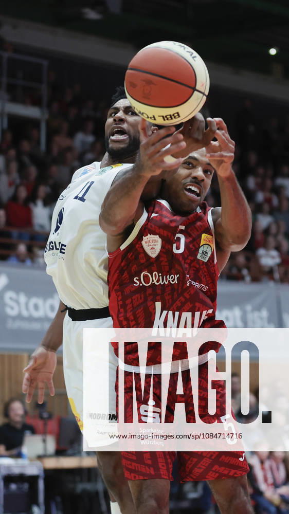 Pictured, from left: Anthony Gaines of Syntainics MBC, No. 11, in a rebound battle against Kenny Dye of Wuerzburg Baskets, No. 5, 18 10 2026, Fitness First Wuerzburg Baskets vs. SYNTAINICS MBC, Netto BBL Cup, Round of 16, Germany, 97072, tectake Arena Wuerzburg,