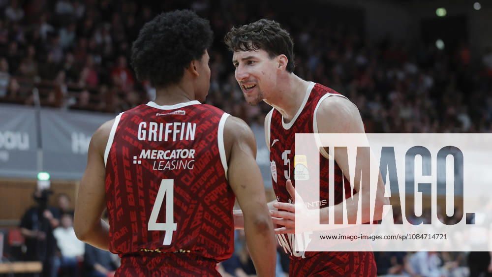 Pictured from left: Sam Griffin (Wuerzburg Baskets, 4) and Alen Pjanic (Wuerzburg Baskets, 35) are talking on October 18, 2026, Fitness First Würzburg Baskets vs. SYNTAINICS MBC, Netto BBL Cup, Round of 16, Germany, 97072, tectake Arena Würzburg,