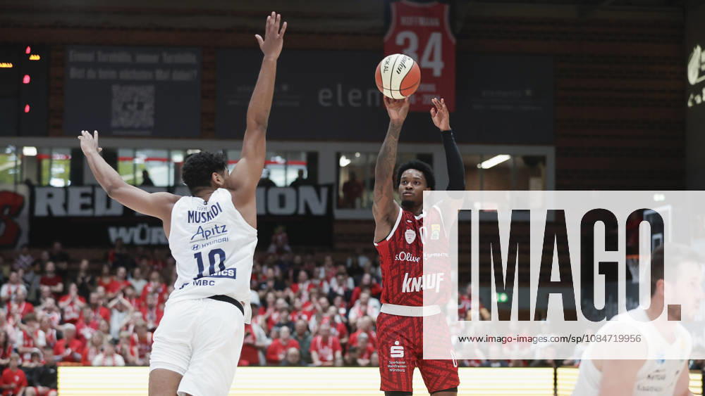 Pictured from left: Kostja Mushidi of Syntainics MBC, 10, against Eddie Colbert III of Wuerzburg Baskets, 0, on a three-point shot, 18, 10, 2026, Fitness First Wuerzburg Baskets vs. SYNTAINICS MBC, Netto BBL Cup, Round of 16, Germany, 97072, tectake Arena Wuerzburg,