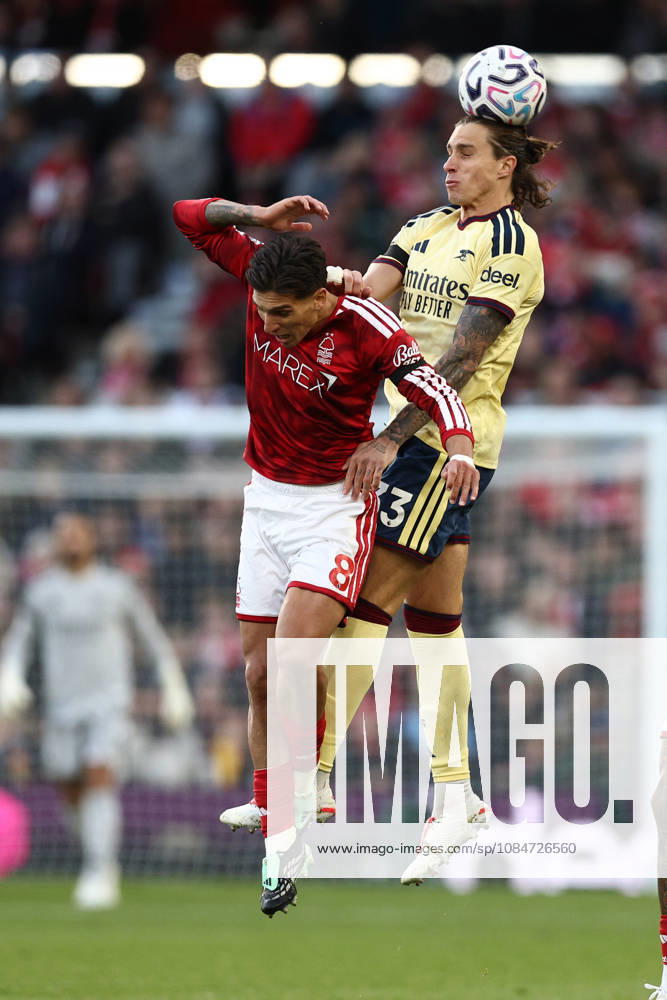 Nottingham, England, 18th October 2026. Nicolas Dominguez of Nottingham Forest and Riccardo Calafiori of Arsenal challenge for the ball during the Nottingham Forest vs Arsenal Premier League match at the City Ground, Nottingham. Picture credit should read: Jake Youle Sportimage . SPI_029_JY_Forest_Arsenal SPI-5083-0029