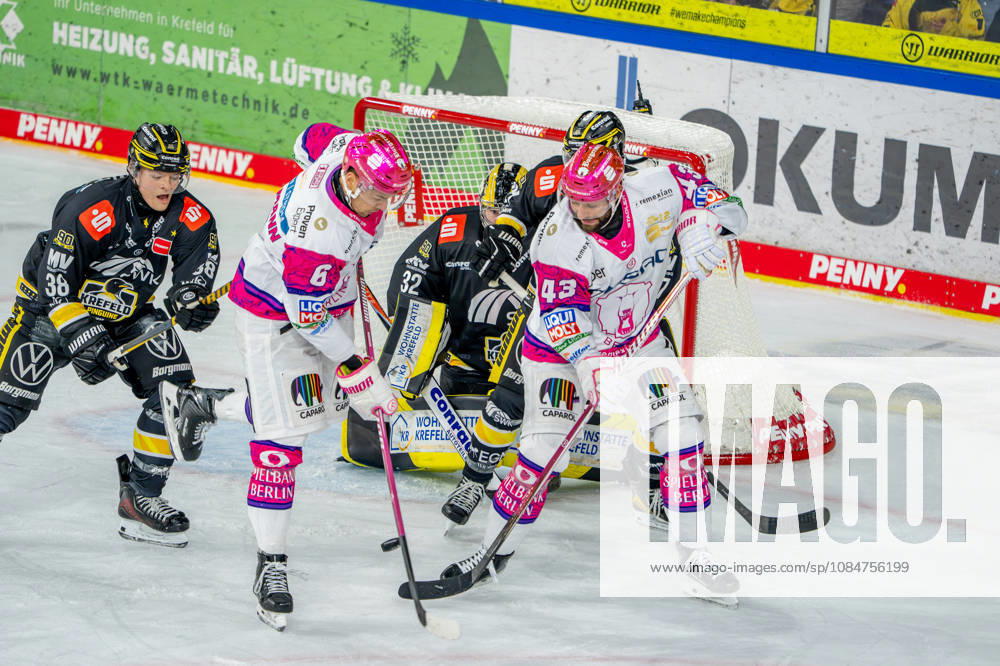 Ice Hockey, DEL, Krefeld Pinguine vs. Eisbären Berlin, 2026–27 Season, YAYLA Arena, Krefeld: Andreas Eder (Eisbären Berlin, 43) and Kai Wissmann (Eisbären Berlin, 06) in front of the net defended by goalie Juha Jatkola (Krefeld Pinguine, 32), next to Tim Schütz (Krefeld Pinguine, 38), North Rhine-Westphalia, Germany