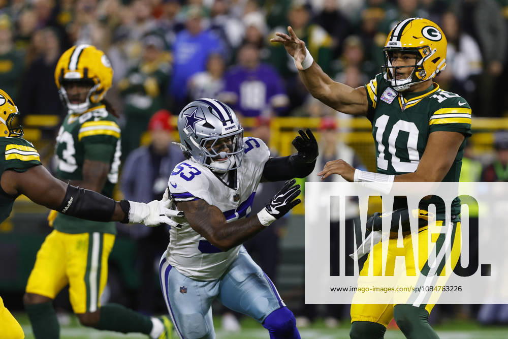 GREEN BAY, WI - OCTOBER 18: Green Bay Packers quarterback Jordan Love (10) passes while Dallas Cowboys linebacker Dee Winters (53) closes in during a game between the Green Bay Packers and the Dallas Cowboys on October 18, 2026 at Lambeau Field in Green Bay, WI. (Photo by Larry Radloff Icon Sportswire) NFL, American Football Herren, USA OCT 18 Cowboys at Packers Icon2610181249