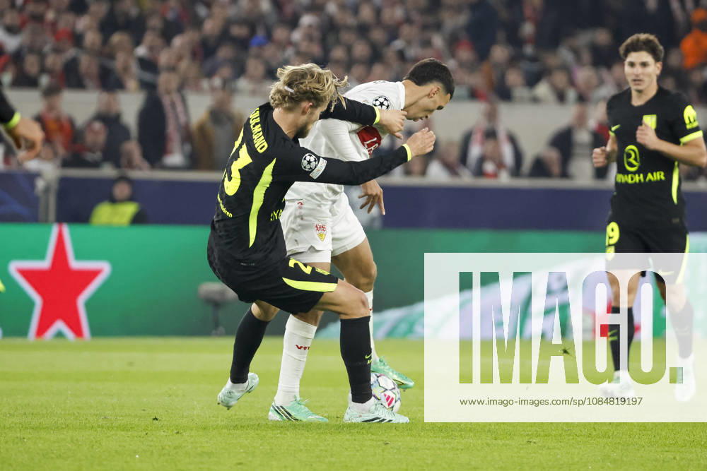 Morten Hjulmand of Atlético Madrid, No. 23, and Bilal El Khannouss of VfB Stuttgart, No. 11, in a tackle, Germany, soccer, UEFA Champions League, Matchday 3, 2026–2027, VfB Stuttgart vs. Atlético Madrid, October 20, 2026, Stuttgart Arena, Stuttgart, Germany