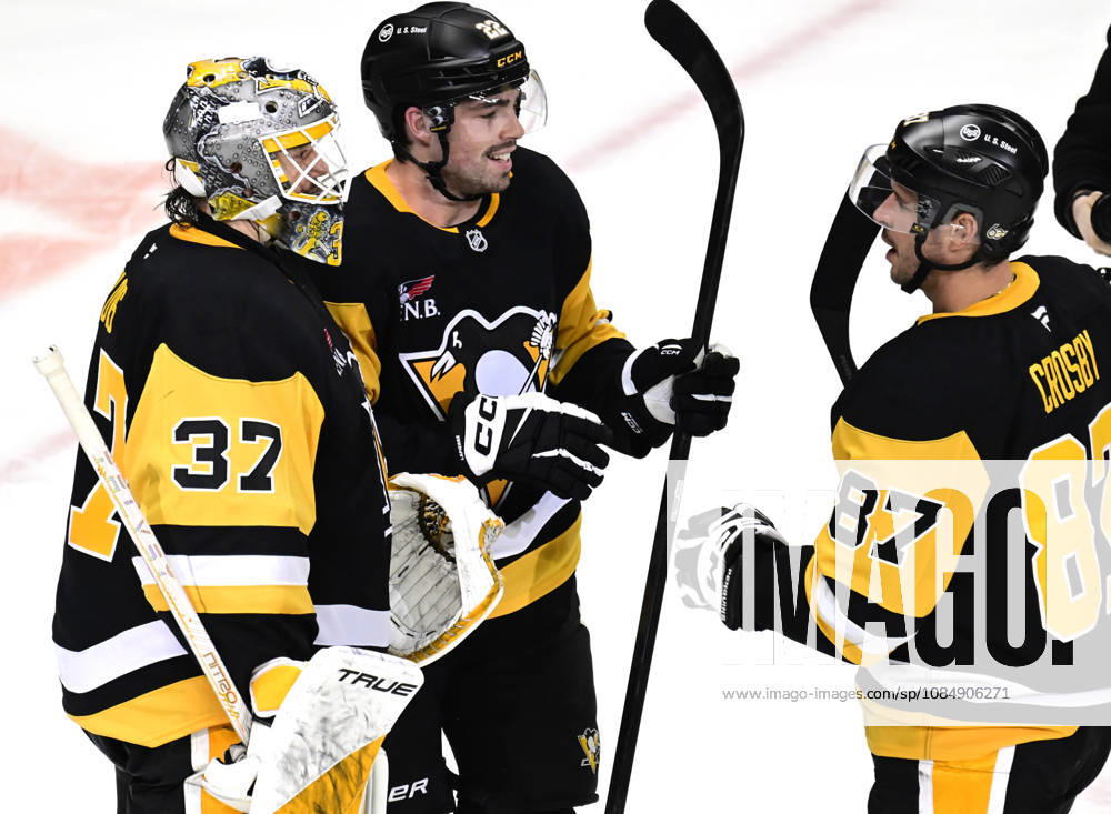 Pittsburgh Penguins goaltender Arturs Silovs (37) celebrates the Penguins 4-0 win against the Florida Panthers with Pittsburgh Penguins center Hendrix Lapierre (22) and Pittsburgh Penguins center Sidney Crosby (87) at PPG Paints Arena in Pittsburgh on Thursday, October 22, 2026. Pittsburgh Penguins goaltender Arturs Silovs (37) recorded 26 saves in the win. PIT2026102215 ARCHIExCARPENTER