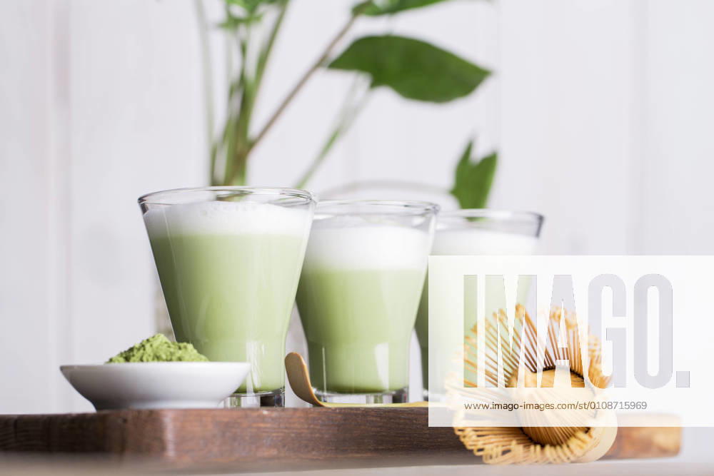 Preparing matcha latte beverage