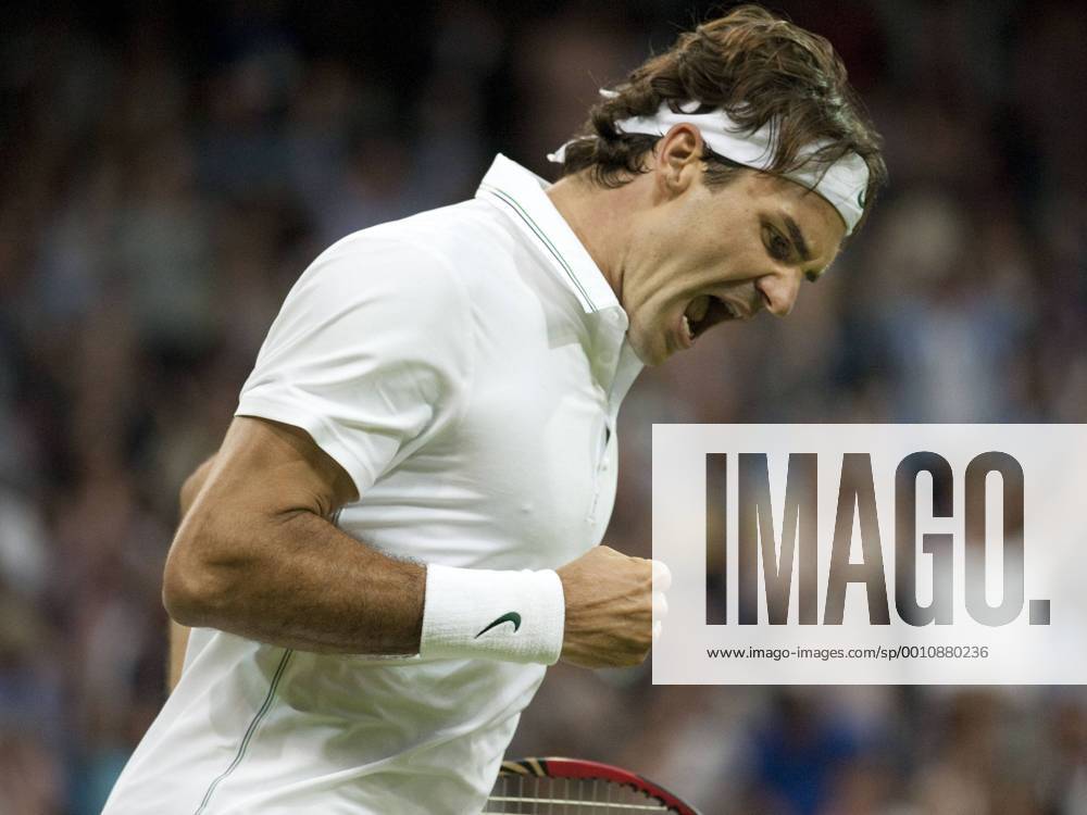 Roger Federer of Switzerland reacts after winning the fourth set tie-break in his match in the third round of the Wimbledon Championships, played at All England Lawn Tennis and Croquet Club, London, England TENNIS: JUN 29 Wimbledon Championships Icon20133136
