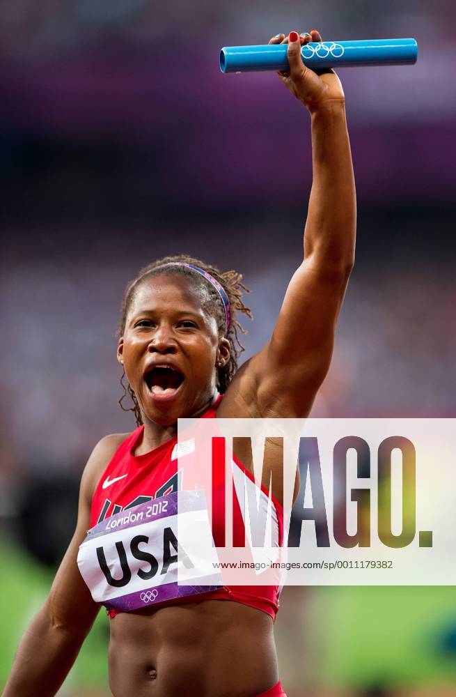 London, GBR - Lauryn Williams of the United States acknowledged the cheers of the crowd following the USA s 4 X 100m relay during heat 1 of the event at Olympic Stadium during the 2012 Summer Olympic Games in London, England, Thursday, August 9, 2012. The United States team qualified by finishing first in a time of 41.64. 2012 Summer Olympics Women s Relay - ZUMAm67
