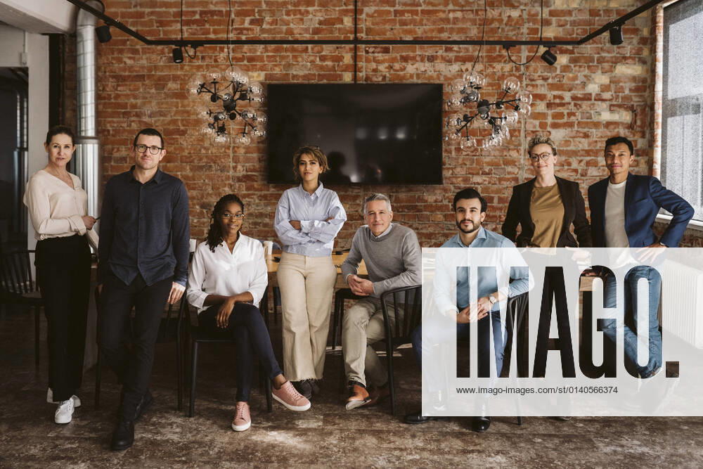 Portrait of multi-ethnic business team in board room at office Sweden, Stockholm, model released, property released