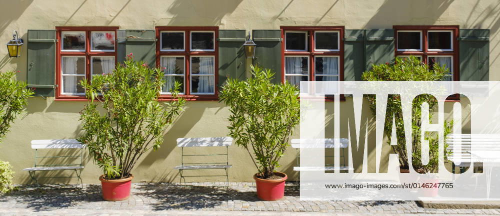 House facade with plants and chairs, Dinkelsbühl, Middle Franconia, Bavaria, Germany 1100402129