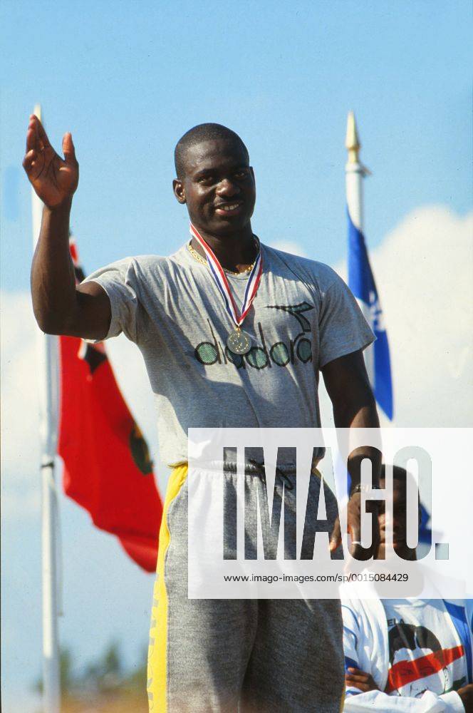 Athletics - 1988 Canada Olympic Trails 100m winner Ben Johnson receives his medal on the podium. 10 08 1988