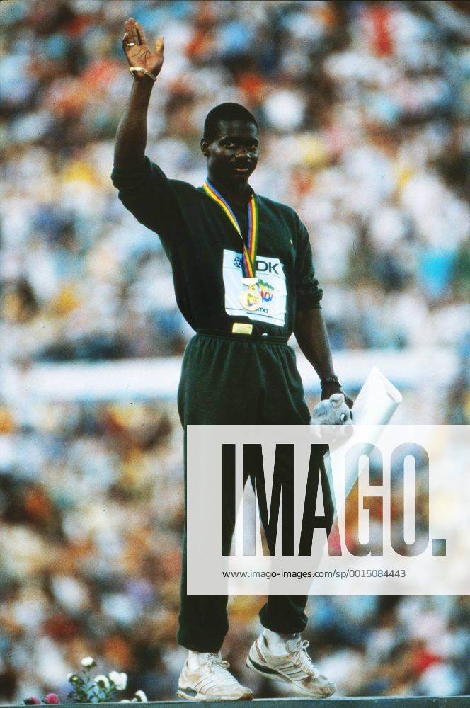 Athletics - 1987 IAAF Rome World Championships - Men s 100m Medal Presentation Canada s Ben Johnson receives his gold medal after sensationally setting a new World Record of 9.83s at the Stadio Olimpico. 30 08 1987