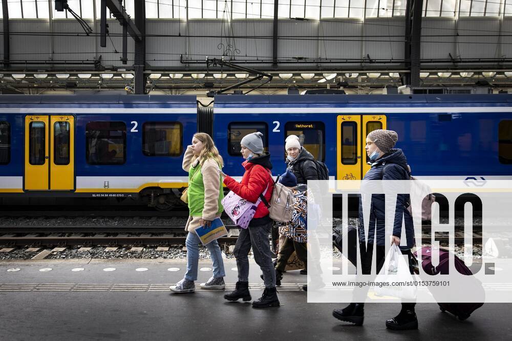 AMSTERDAM Ukrainian refugees after arrival by train from Berlin at Amsterdam Central Station where the first reception and registration of the refugees takes place ANP RAMON VAN FLYMEN