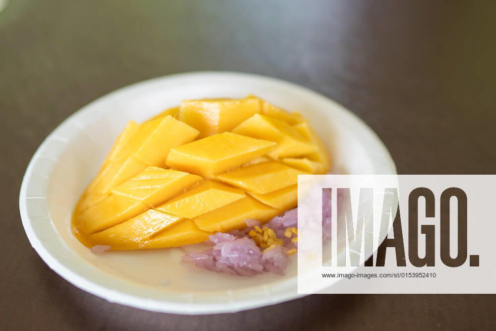 Ripe mango and sticky rice(purple color from butterfly pea flower) with coconut milk Thai dessert., model released, , property released, , 33930156.jpg, asia, asian, background, beautiful, coconut, coconut milk, colour, cuisine, culture, delicious, dessert, dish, eat, food, fresh, fruit, glutinous, gourmet, healthy, mango, milk, nature, nut, nutrition, organic, plate, rice, ripe, sticky, sticky rice, style, sugar, summer, sweet, tasty, thai, thai dessert, thai food, thai fruits, thailand, topping, traditional, tropical, yellow