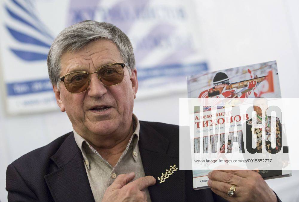 ITAR-TASS: MOSCOW, RUSSIA. JANUARY 24, 2014. Four-time Olympic Champion, biathlete Alexander Tikhonov presents his book during a meeting with media people. RE136C1C