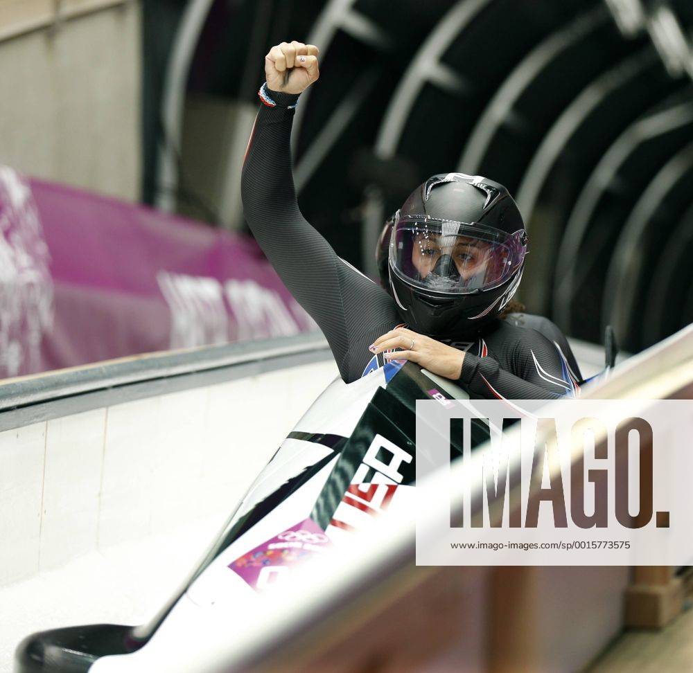Feb. 18, 2014 - Sochi, Russia - USA-1 driver Elana Meyers celebrates with teammate Lauryn Williams after their second run in the Women s Two-Man Bobsled at the Sanki Sliding Center at the 2014 Sochi Winter Olympics. USA-1 had the top results after two runs. Women s Bobsleigh - Sochi 2014 - ZUMAsc5