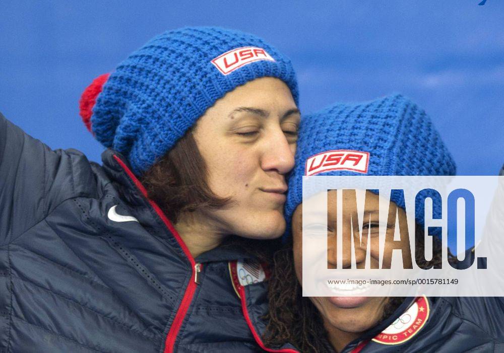 (140219) -- SOCHI, Feb. 19, 2014 (Xinhua) -- Silver medalists Elana Meyers (L) and Lauryn Williams of the United States celebrate during the flower ceremony for women s bobsleigh at the 2014 Sochi Winter Olympic Games in Sochi, Russia, Feb. 19, 2014. (Xinhua Fei Maohua) (SP)OLY-RUSSIA-SOCHI-WOMEN S BOBSLEIGH