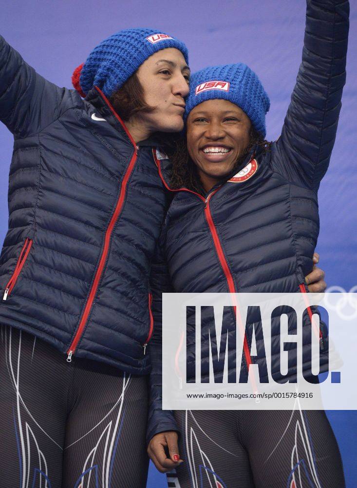Feb. 19, 2014 - Sochi, RUS - USA-1 bobsled driver Elana Meyers kisses teammate Lauryn Williams after placing second in the women s bobsled finals during the Winter Olympics on Wednesday, Feb. 19, 2014, in Sochi, Russia. SOCHI OLYMPIC GAMES WOMEN S BOBSLED, BOBSLEIGH - ZUMAm67