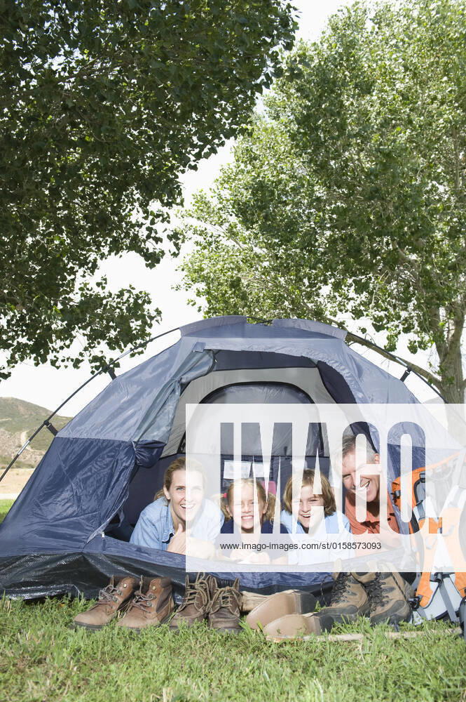 Family of four smiling from a tent, model released, , property released, , 10124480.jpg, Outdoors,Day,Smiling,people,Family,Happiness,Mother,Children,Parents,Laughing,leisure activity,Camping,Backpack,Countryside,Footwear,Caucasian,outside,Tent,Looking At Camera,camping equipment,rural,four people,Family Holiday,Activity Holiday,Walking Boots,Adventure Holiday,Outdoor Activity,family vacation,Camping Pitch,Tent Flap, California
