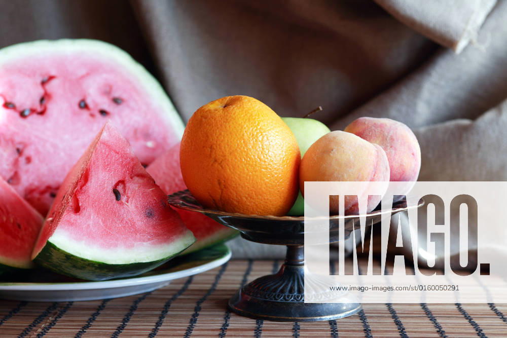 Still life with various fruits in metal bowl near sliced watermelon , 19643446.jpg, Fruit, Berry, Watermelon, Food, Summer, Plant, Healthy Eating, Dessert, Background, Macro, Closeup, Red, Slice, Cut, Portion, Plate, Table, Dishware, Morning, Breakfast, Bowl, Still Life, Bowl, Peach, Apple, Orange, Canvas, Decoration, Interior, Vintage, Retro,