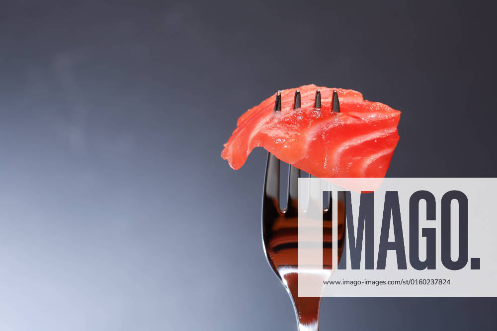 Closeup of steel fork with slice of salmon on dark background , 20415712.jpg, Salmon, Trout, Chinook, Fish, Snack, Appetizer, Gourmet, Meal, Food, Cooking, Restaurant, Portion, Slice, Eating, Seafood, Delicacy, Salted, Fork, Silverware,