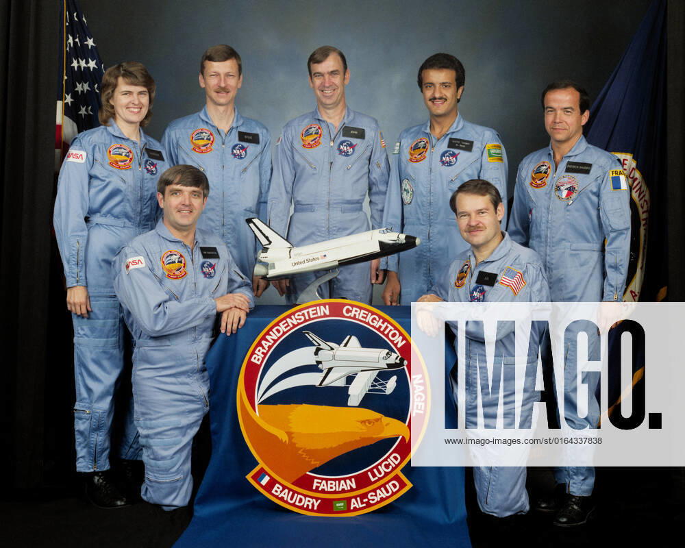 S85-32877 (20 May 1985) --- Seven 51-G crew members take a break from training and other preparations for their June flight aboard the Discovery to pose for a group photograph. Kneeling in front are astronauts Daniel C. Brandenstein (left) and John O. Creighton, commander and pilot, respectively. Astronauts Shannon W. Lucid, Steven R. Nagel and John M. Fabian, mission specialists (l.-r.) join Payload Specialists Sultan Salman Abdelazize Al-Saud (second right) and Patrick Baudry on the back row.