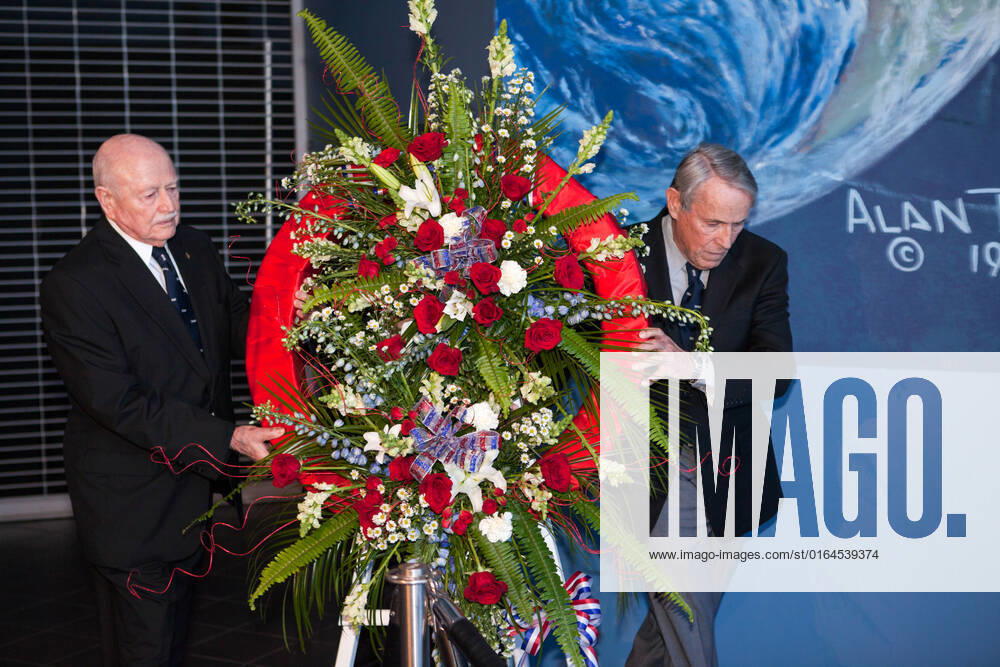CAPE CANAVERAL, Fla. Former NASA astronauts Gerald P. Carr, left, and Edward G. Gibson place a wreath on an easel during a ceremony to honor former NASA astronaut William R. Pogue at the United States Astronaut Hall of Fame at the Kennedy Space Center Visitor Complex. In the background is a painting by former NASA astronaut Alan Bean. Col. Pogue, pilot on NASA s Skylab 4 mission in 1973-74, died March 3. He was 84 years old. Skylab 4 was the third and final manned visit to the Skylab orbital workshop, launched Nov. 16, 1973, and concluded Feb. 8, 1974. At 84 days, 1 hour and 15 minutes, Skylab 4 was the longest manned space flight to that date. Pogue was accompanied on the record-setting 34.5-million-mile flight by Commander Carr and sc