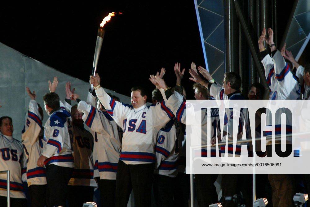 Feb. 8, 2002 - U.S. - SALT LAKE CITY, UT-- Mike Eruzione and the rest of the 1980 US Hockey team elate before lighting the cauldron at the Winter Olympic Opening Ceremony Friday February 8, 2002 in Salt Lake City, Utah. (SE) - Feb. 8, 2002 - ZUMAm67