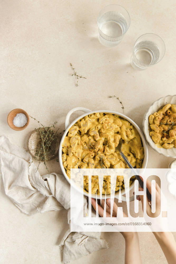 Mac n Cheese flat lay with hands