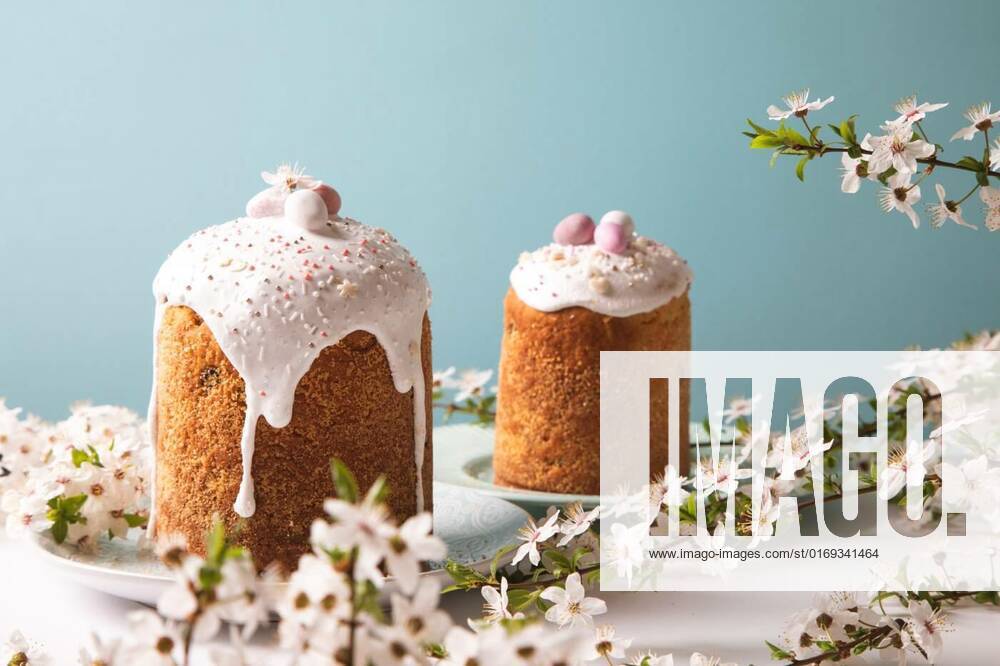 Easter cake with glace icing and decoration. Postcard with Easter bread. Christian traditions. Copy space. White background., Easter cake with glace icing and decoration. Postcard with Easter bread. Christian traditions. Copy space. White background, Easter cake with glace icing and decoration. Postcard with Easter bread. Christian traditions. Copy space. White background, 07.04.2022,
