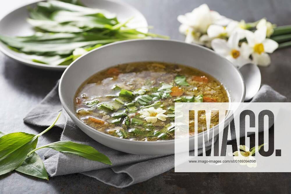 Soup vegetable, Vegetable soup with fresh wild garlic leaves close up. Soup with seasonal vegetables. Healthy spring detox food ingredients., Vegetable soup with fresh wild garlic leaves close up. Soup with seasonal vegetables. Healthy spring detox food ingredients., 29.04.2022,