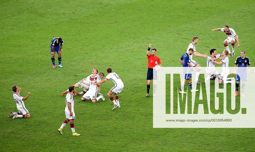 Philipp Lahm, Toni Kroos, Referee Nicola Rizzoli, Per Mertesacker, Mats Hummels, Andre Schürrle, Benedikt Höwedes Germany s players celebrate the victory after the final match between Germany and Argentina of 2014 FIFA World Cup at the Estadio do Maracana Stadium in Rio de Janeiro, on July 13, 2014.