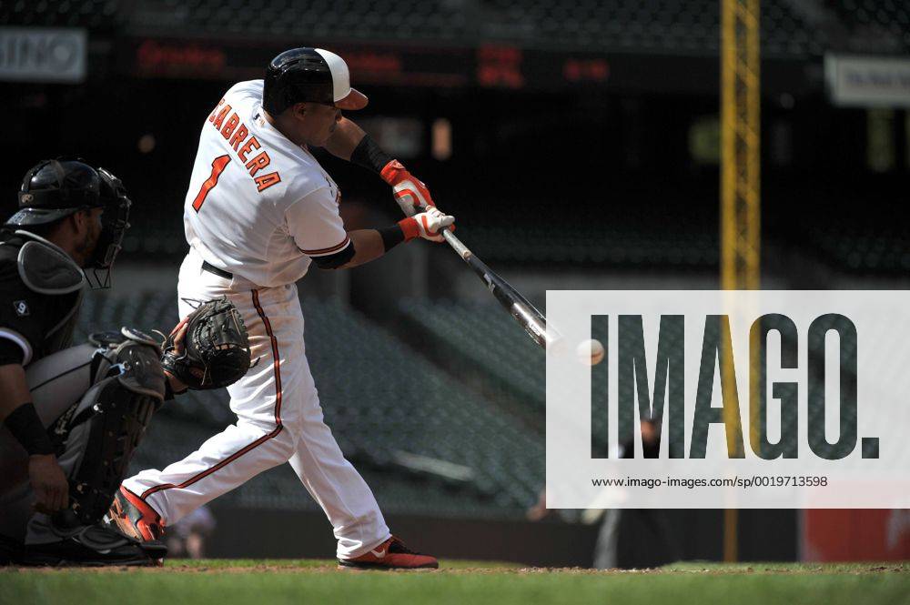 Baltimore Orioles Daniel Cabrera connects for a pop out against the Chicago White Sox at Orioles Park at Camden Yards in Baltimore, Maryland on April 29, 2015. For the first time in Major League Baseball s history fans were not allowed to the game because of the ongoing civil unrest and protest in Baltimore in the wake of Freddie Gray s death. The late 25-year-old died earlier this month from a spinal injury while in police custody. BAL20150429333 KEVINxDIETSCH