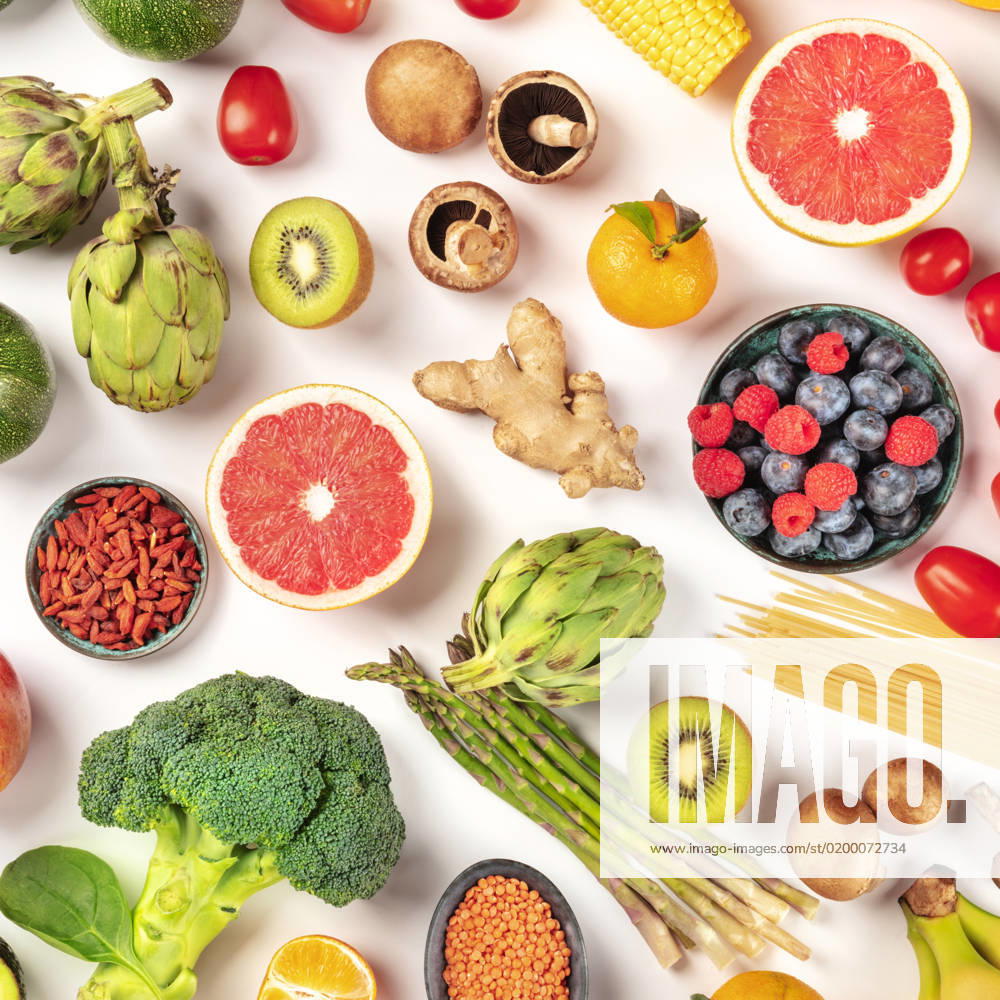 Vegan food. Healthy diet concept. Fruits, vegetables, pasta, nuts, legumes, mushrooms, overhead square shot on a white background. A flatlay composition Vegan food. Healthy diet concept. Fruits, vegetables, pasta, nuts, legumes, mushrooms, overhead square shot on a white background. A flatlay composition