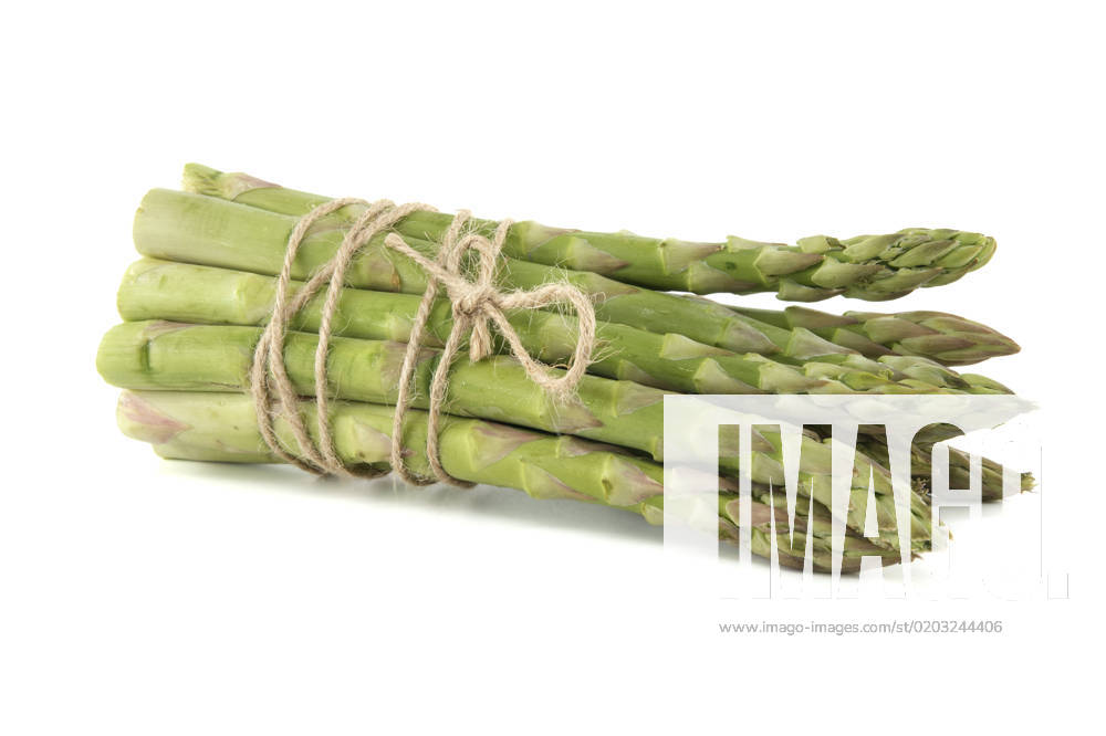Fresh bunch of green asparagus tied with jute cord Fresh bunch of green asparagus tied with jute cord isolated on white background. Spring vegetable, eco friendly packaging