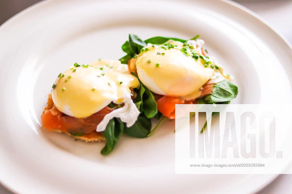Luxury breakfast, brunch and food recipe, poached eggs with salmon and greens on gluten-free toast for restaurant menu and gastronomy Luxury breakfast, brunch and food recipe, poached eggs with salmon and greens on gluten-free toast for restaurant menu and gastronomy branding