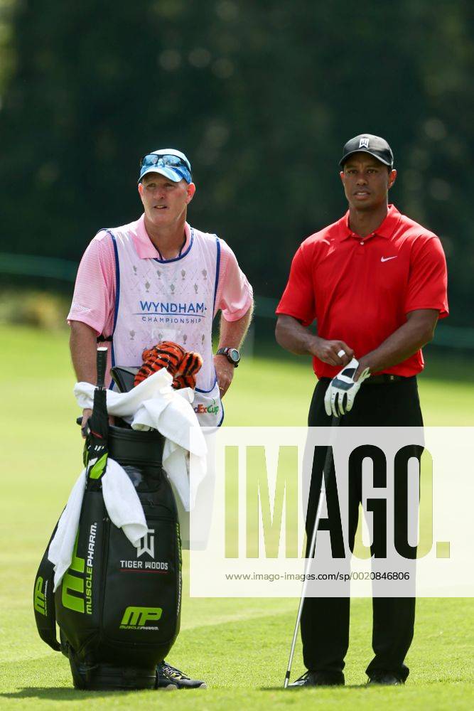 Aug. 23, 2015 - Greensboro, North Carolina, United States - Tiger Woods (R) and his caddie Joe LaCava wait to hit on the 9th fairway during the final round of the Wyndham Championship at Sedgefield CC. PGA Golf Herren 2015: Wyndham Championship - Final Round - ZUMAw109