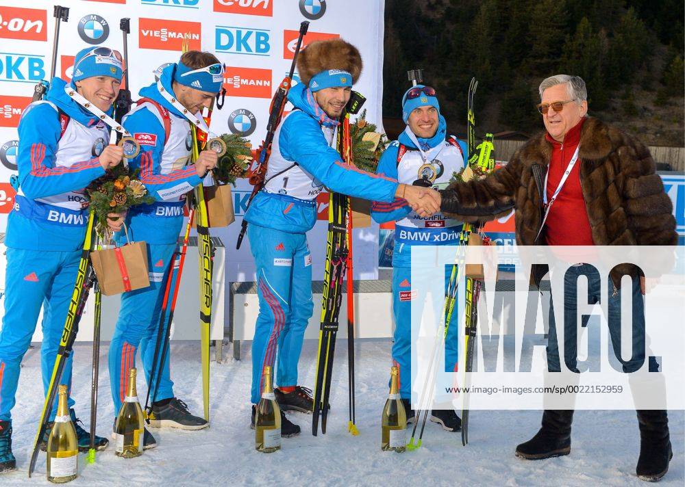 HOCHFILZEN, AUSTRIA. DECEMBER 13, 2015. Soviet Olympic biathlon champion Alexander Tikhonov congratulates biathletes Evgeny Garanichev, Anton Shipulin, Dmitry Malyshko, Alexei Volkov of Russia (R-L) on winning the men s 4x7,5km relay race at the 2015 16 Season IBU Biathlon World Cup stage in Hochfilzen. Andrei Ivanov TASS TS013BC2