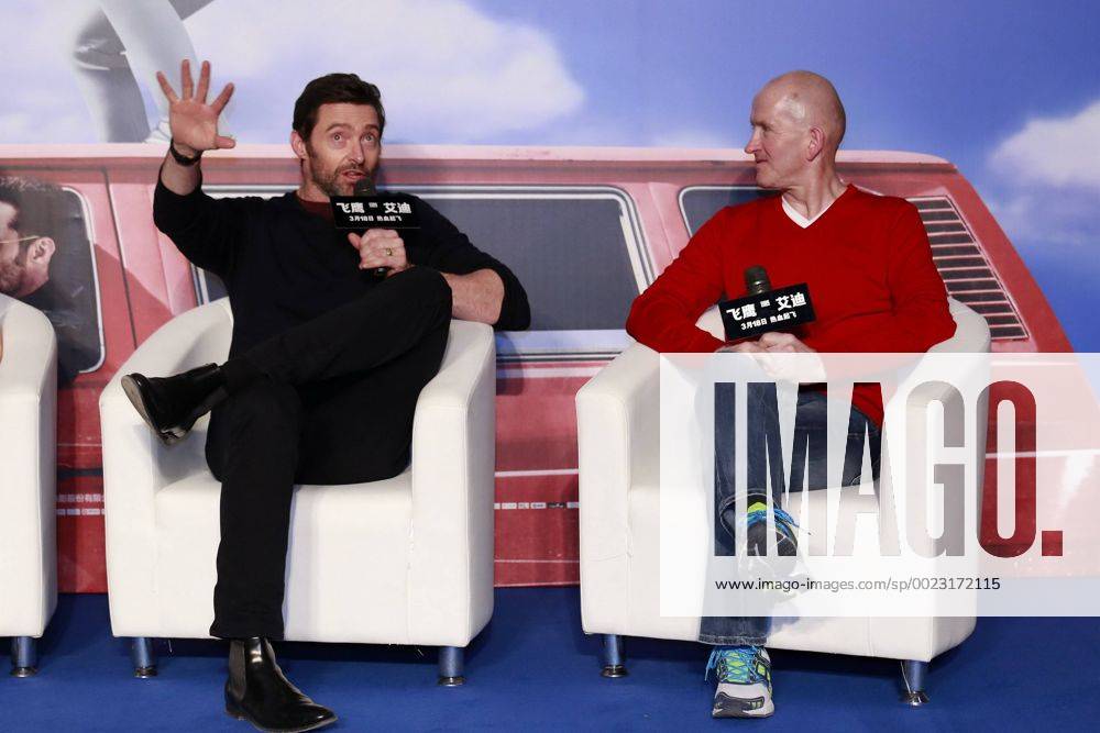 (CHINA OUT) Australian actor Hugh Jackman (L) and British skier Michael Edwards, better known as Eddie The Eagle Edwards, attend a press conference PK Pressekonferenz of director Dexter Fletcher s film Eddie the Eagle on March 9, 2016 in Beijing, China. CFP480894402