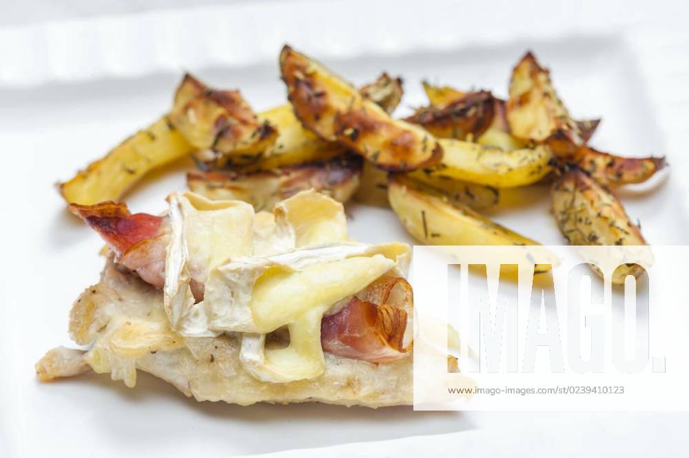 Poultry meat grilled with parma ham and brie cheese served with roasted potatoes, poultry meat grilled with parma ham and brie cheese served with roasted potatoes, poultry meat grilled with parma ham and brie cheese served with roasted potatoes, 23.01.2023,