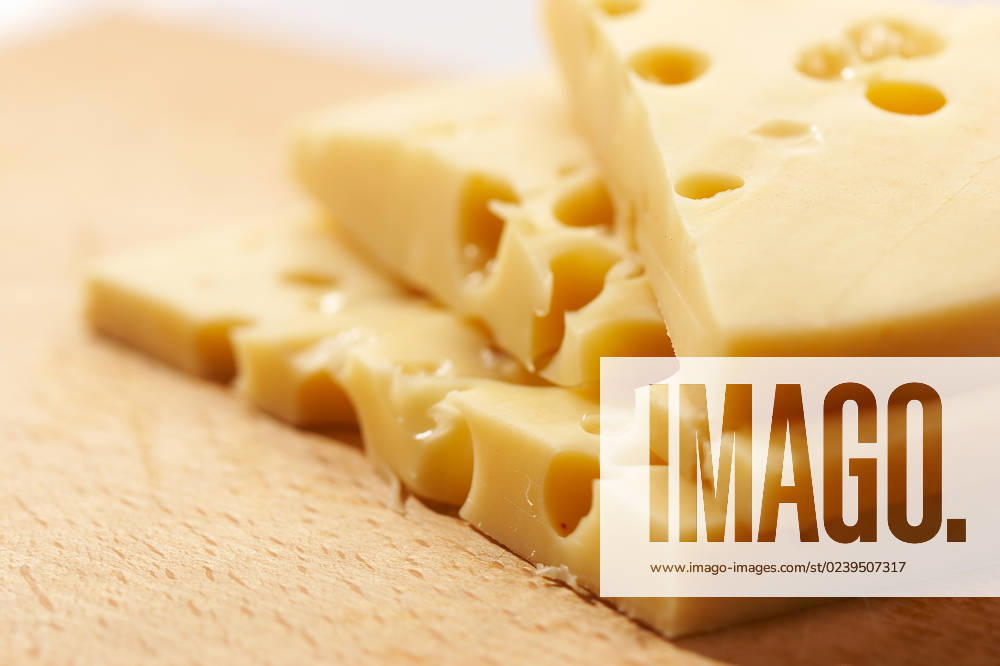 Macro pic of Edam cheese on the wooden board