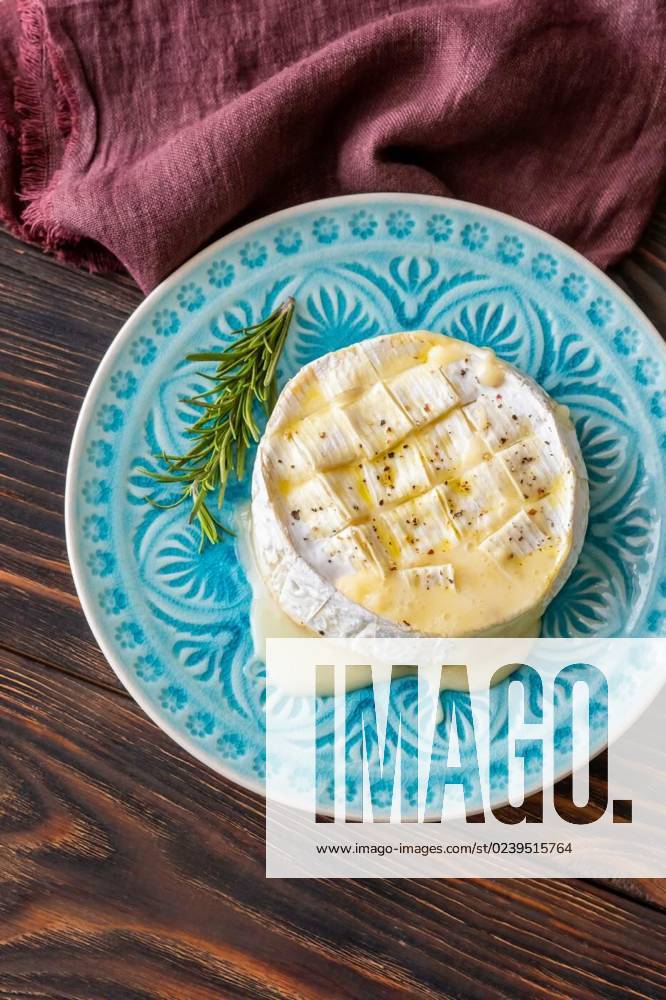 Baked Camembert Cheese, Baked Camembert cheese on the serving plate, Baked Camembert cheese on the serving plate, 22.02.2023,