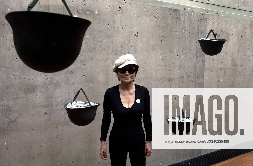 STOCKHOLM 20040528 Yoko Ono gives a press preview of her exhibition at Kulturhuset Multimedia artist Yoko Onos exhibition Remember Love opens to the public on Saturday, May 29th Image The artwork Whisper Piece Helmets consisting of upside-down soldier helmets containing buttons with different texts that visitors are invi